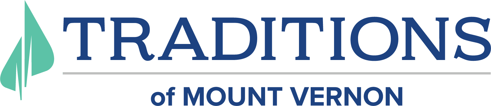 Horizontal Traditions of Mount Vernon logo in blue with a green leaf on the left side